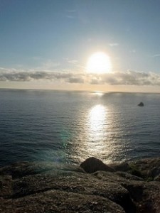 Puesta de sol en cabo Finisterre, vistas casa rural con SPA